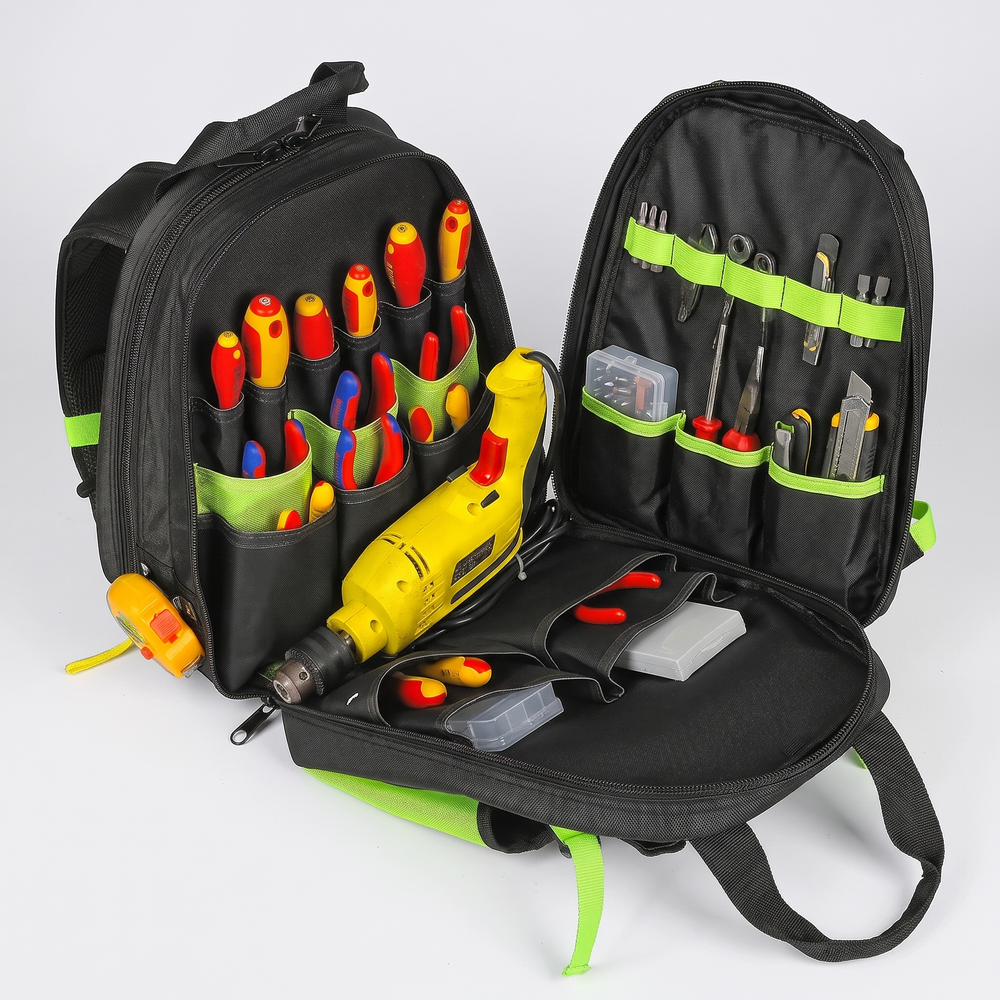 Tool backpack opened flat showing tool pockets in both compartments (tools not included)
