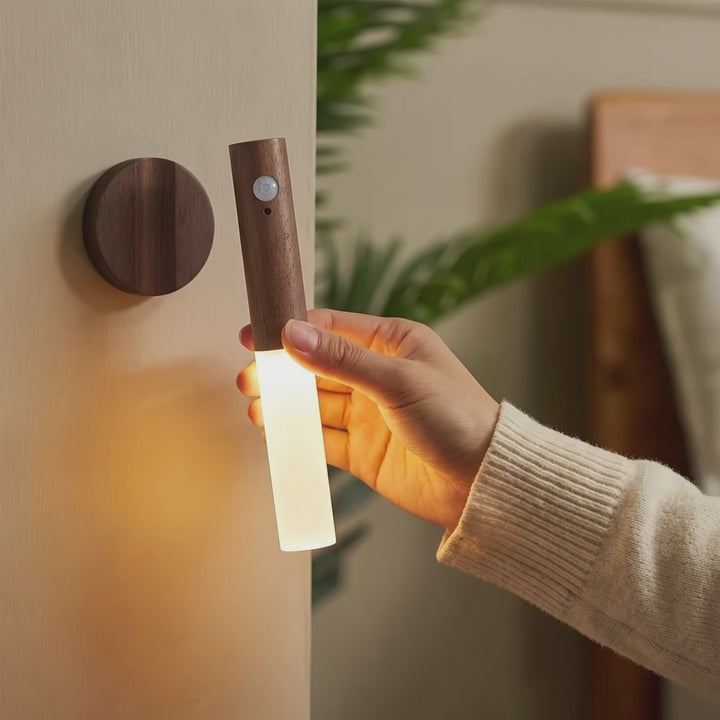 Lifting the light off its magnetic wall mount